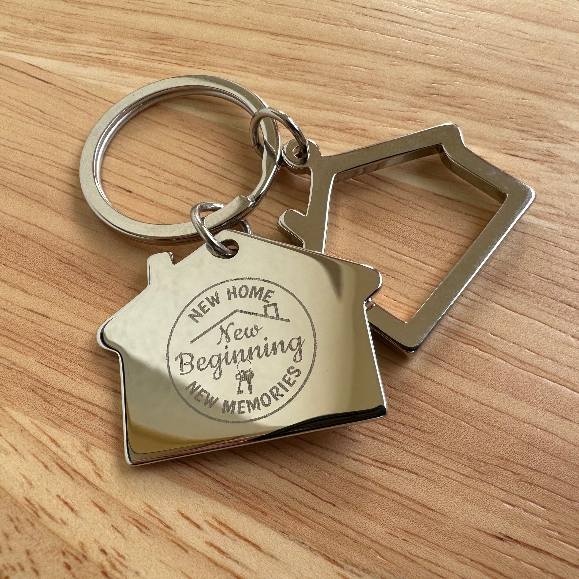 Brelok firmowy z wygrawerowaną nazwą i logo firmy 